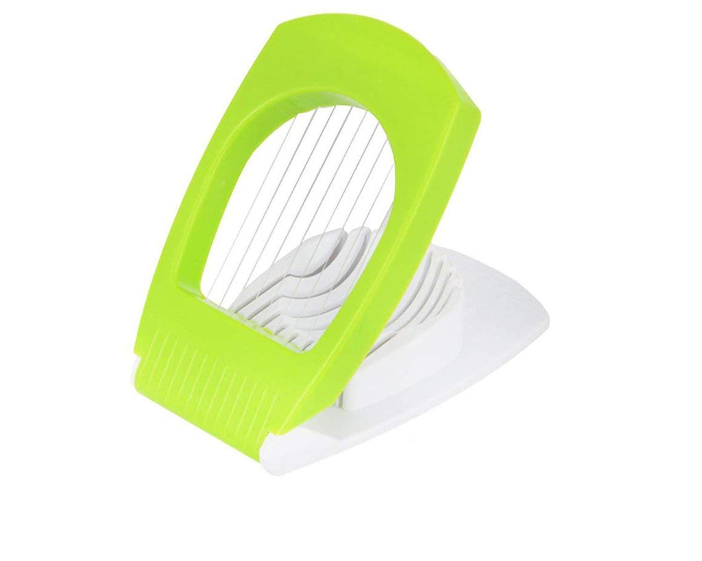 Premium egg cutter cleanly slicing a hard-boiled egg into uniform pieces on a light surface.