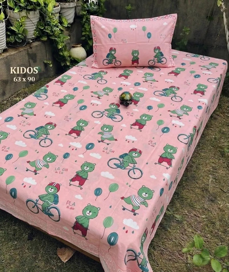 Pink single bedsheet with green bear cycling print and matching pillow cover