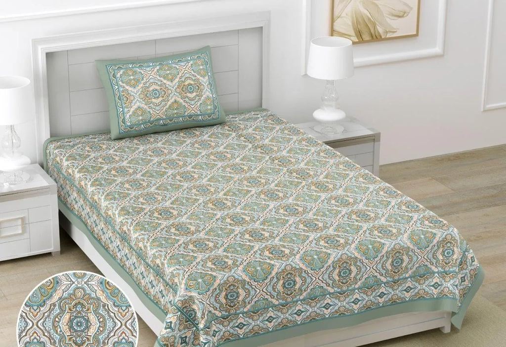 Sage green paisley print single cotton bedsheet with matching pillow cover on bed