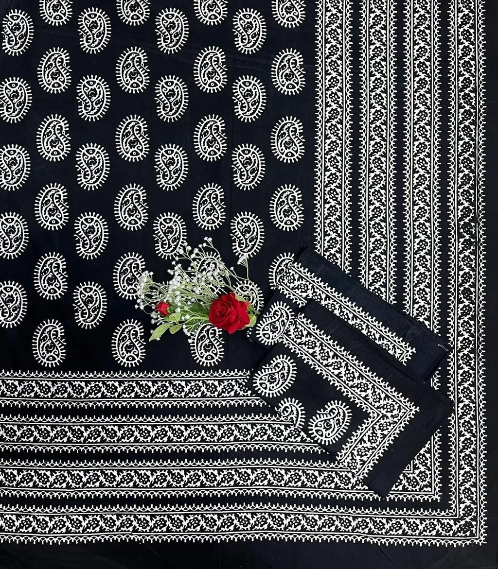 Black cotton bedsheet with white paisley pattern and matching pillow covers