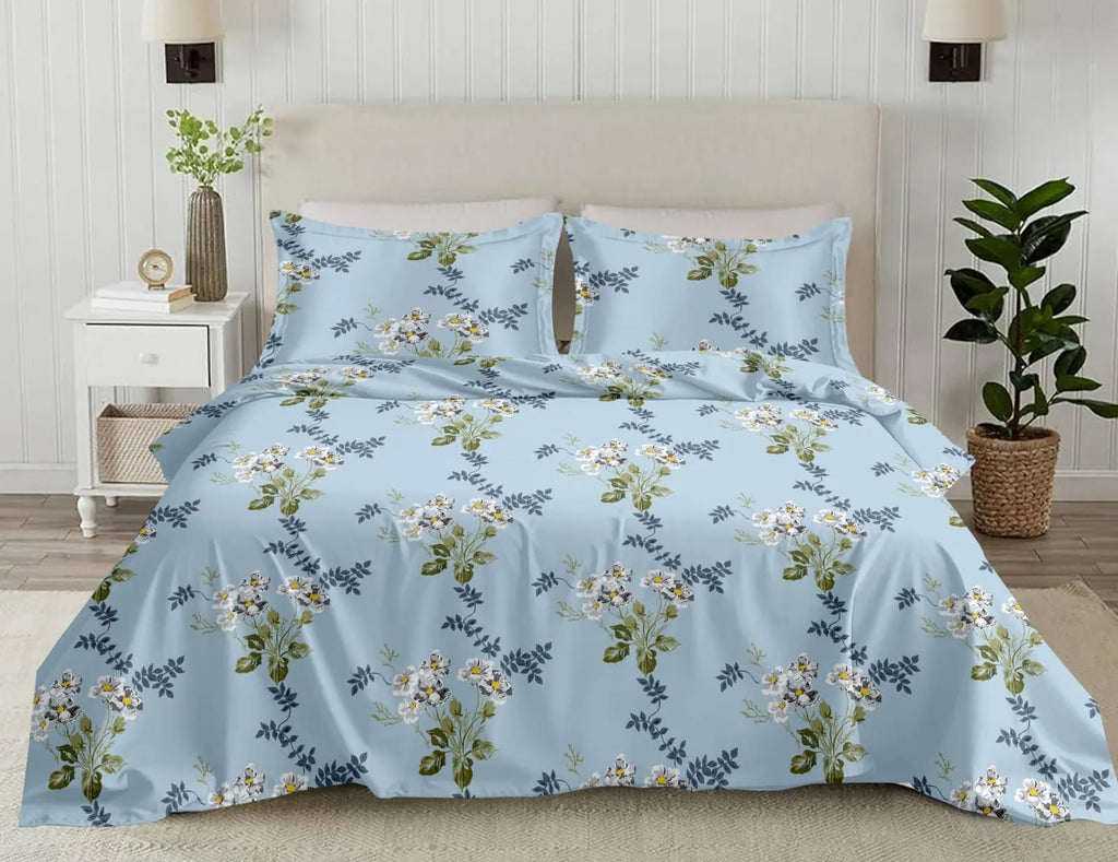 Light blue pure cotton super king bedsheet with white floral digital print and two matching pillow covers on bed
