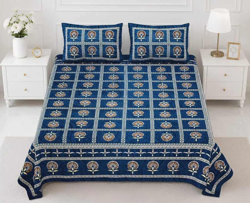 Blue floral print pure cotton super king bedsheet with two matching pillow covers on bed