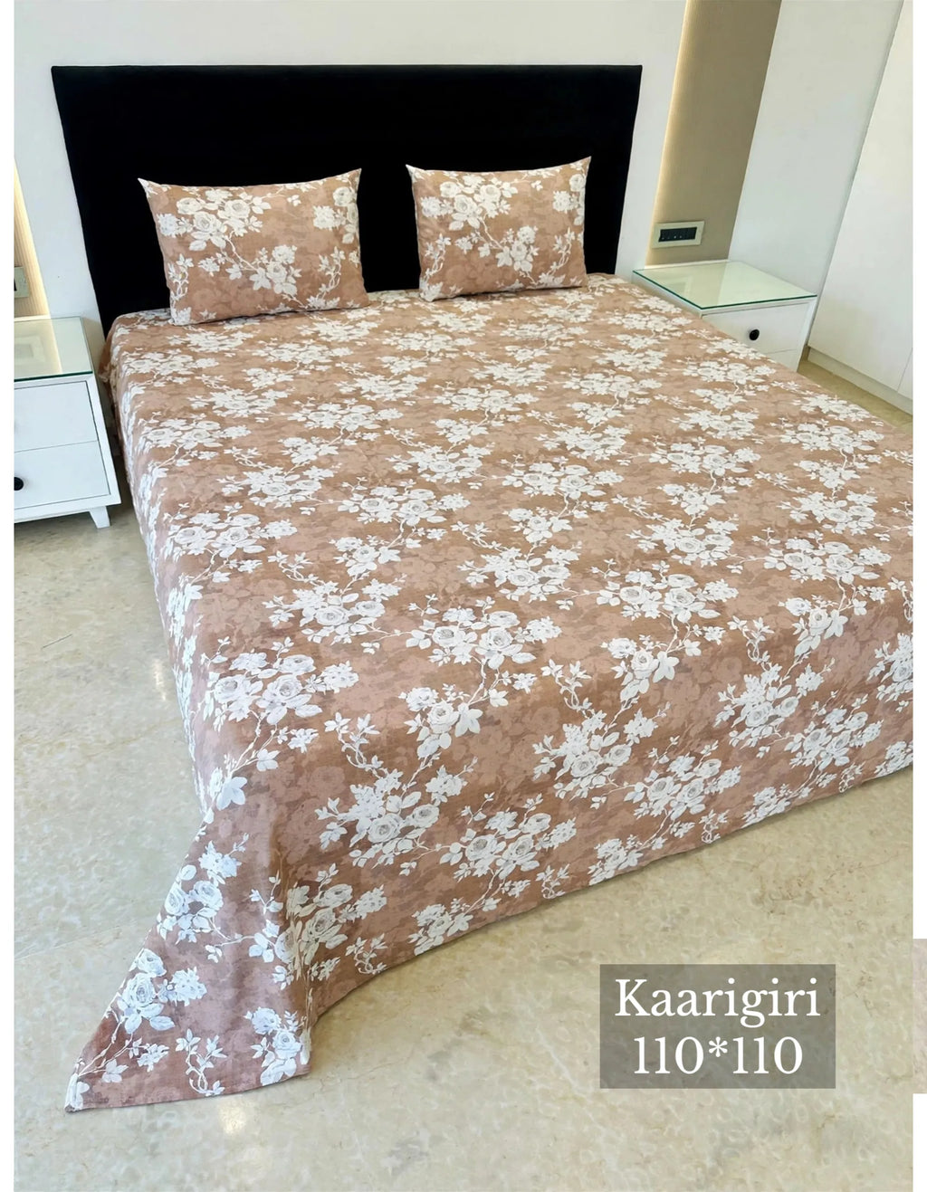 Brown floral printed cotton super king bedsheet 108x108 spread on bed with two matching pillow covers