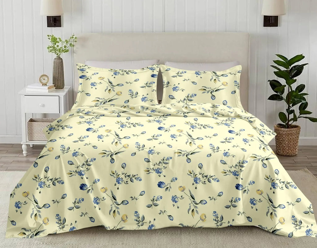 Cream and blue floral digital print cotton bedsheet with two matching pillow covers on super king bed