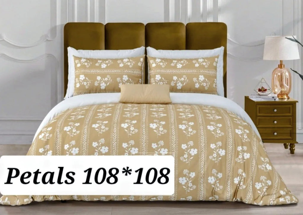 Golden beige floral print cotton bedsheet 108x108 with two pillow covers on a made bed