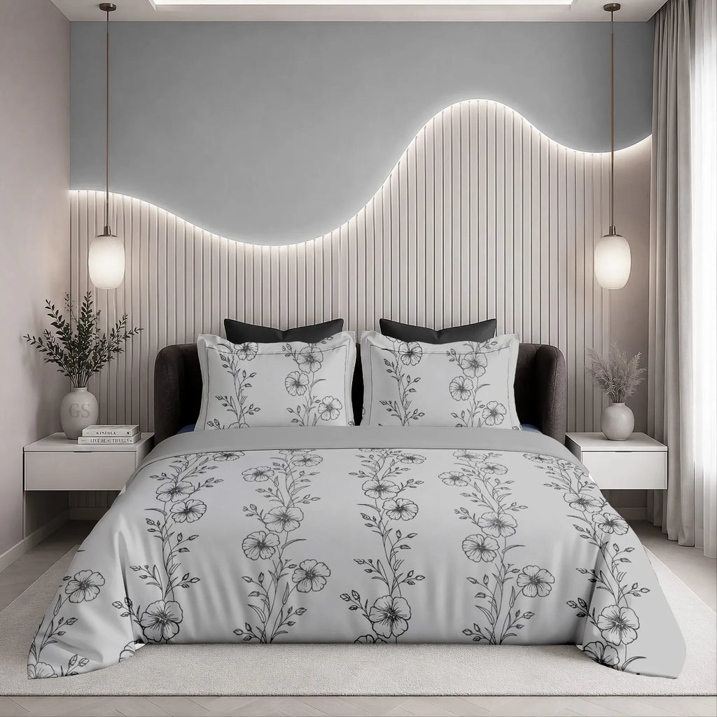 Grey floral print cotton super king bedsheet with pillow covers on modern bed