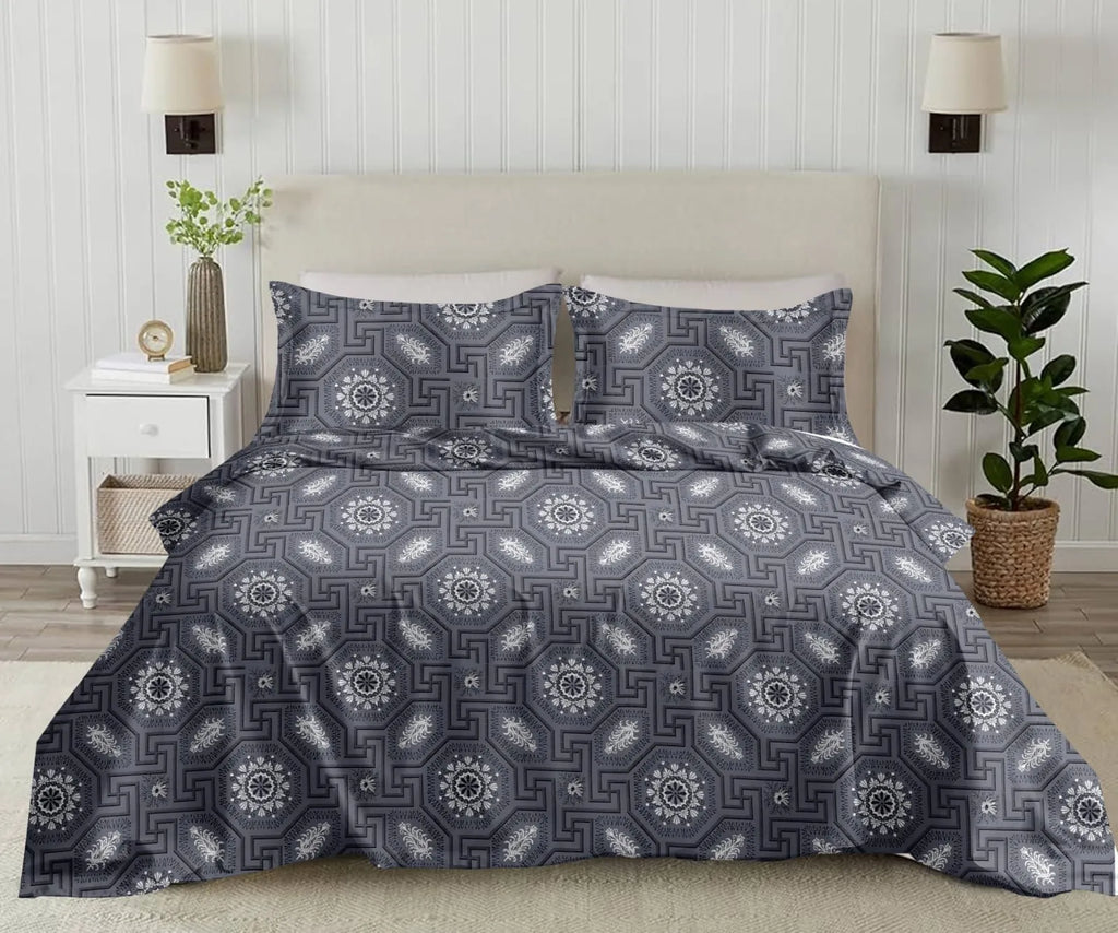 Grey geometric patterned super king cotton bedsheet with two matching pillow covers on bed