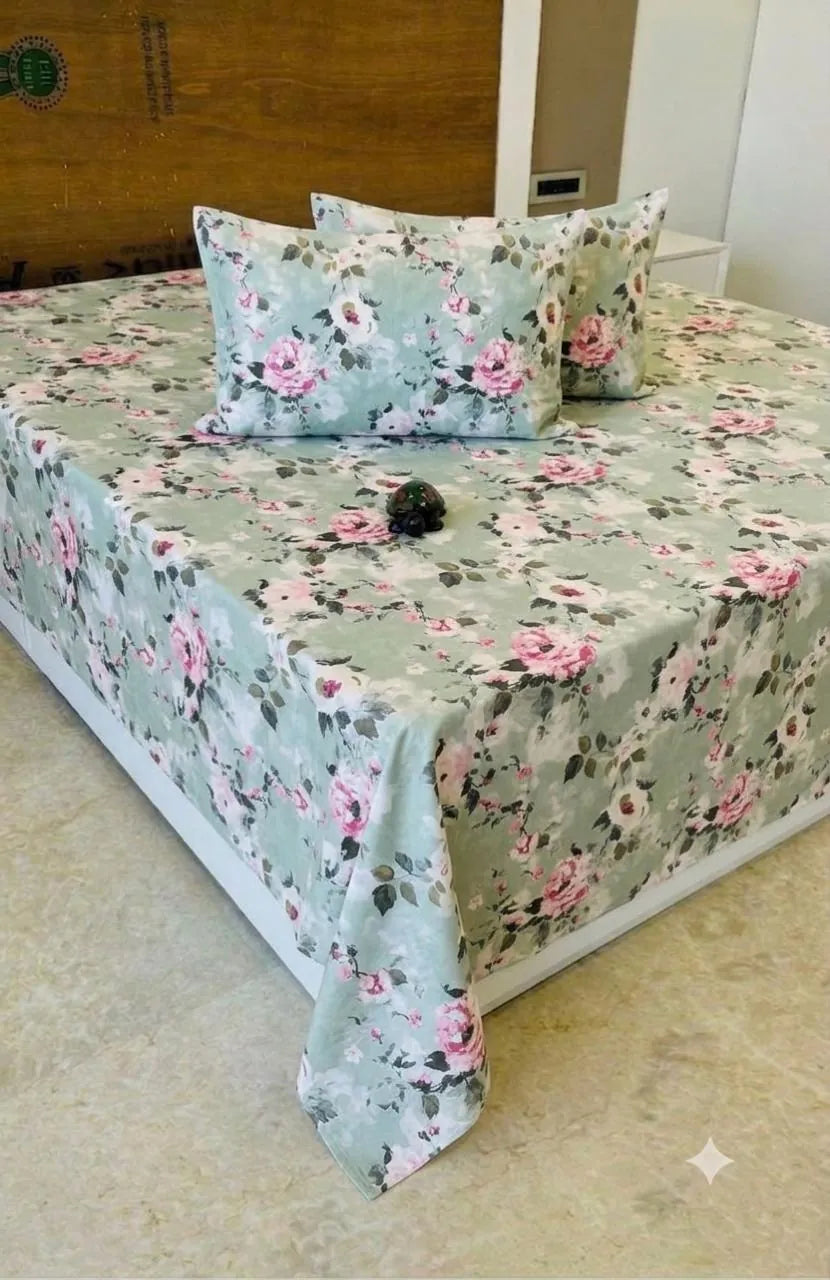 Mint green cotton bedsheet with pink floral print and matching pillow covers