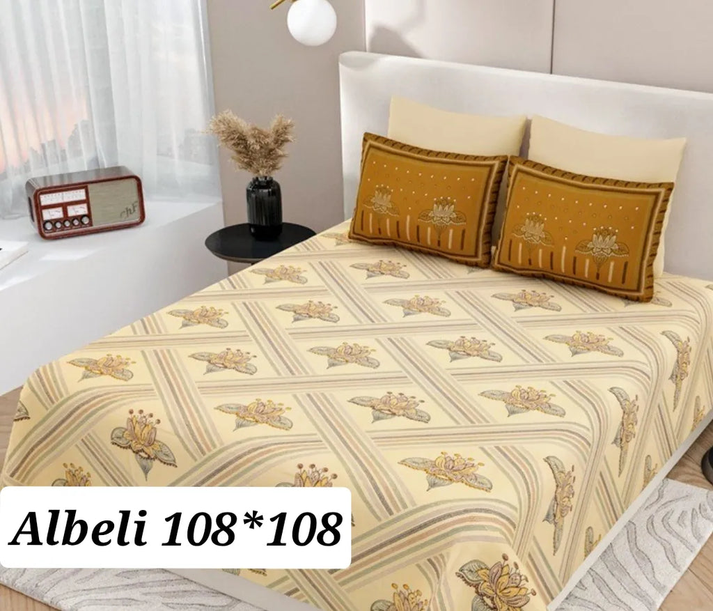 Mustard floral print 100% cotton super king bedsheet with matching pillow covers on bed
