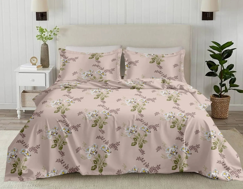 Pink floral print cotton super king bedsheet with matching pillow covers on bed