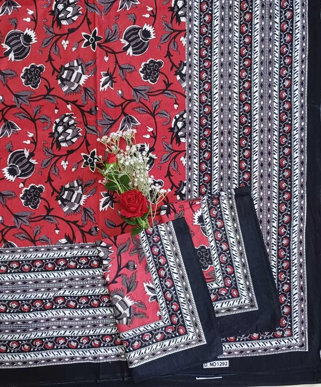 Red floral cotton bedsheet with black border and pillow covers