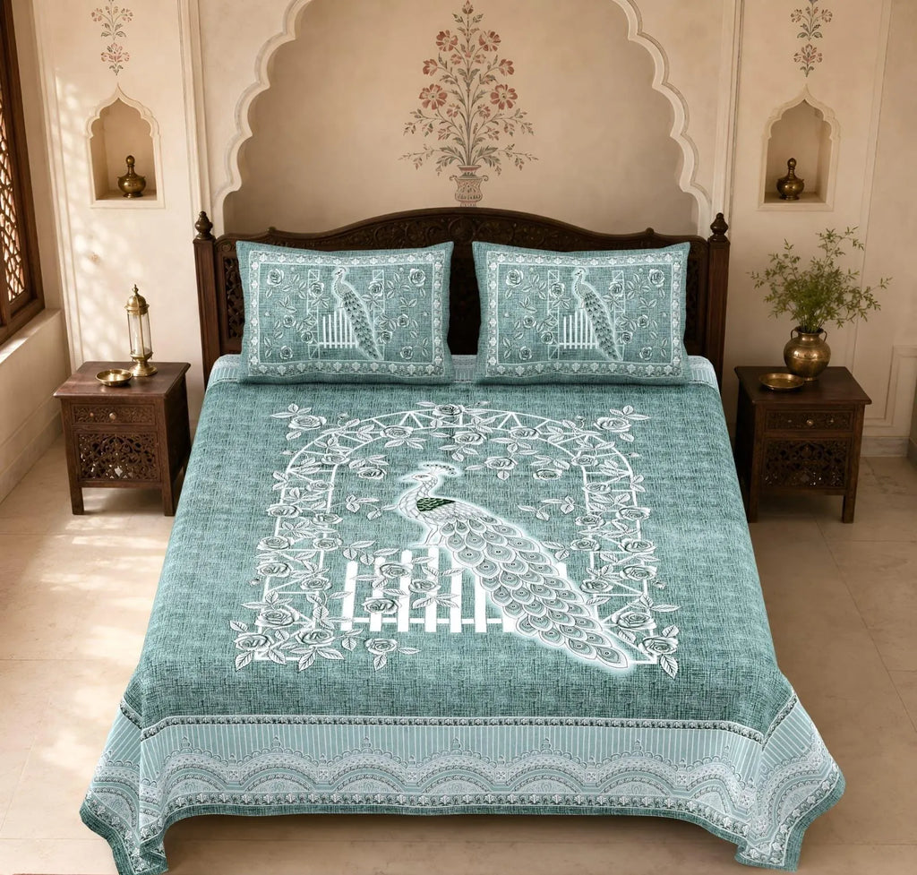 Teal peacock print pure cotton super king bedsheet with two matching pillow covers on bed