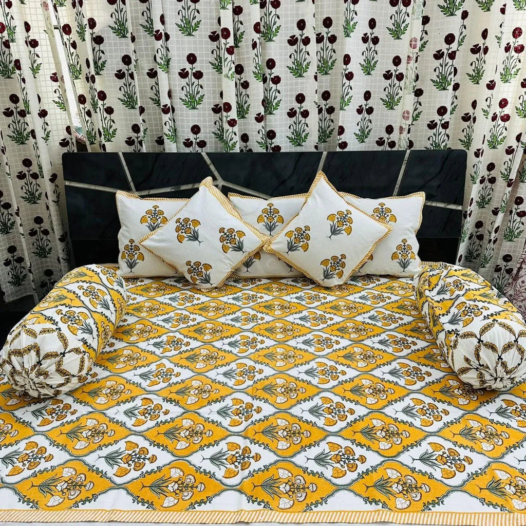 Yellow and white floral print cotton diwan set with cushions and bolsters