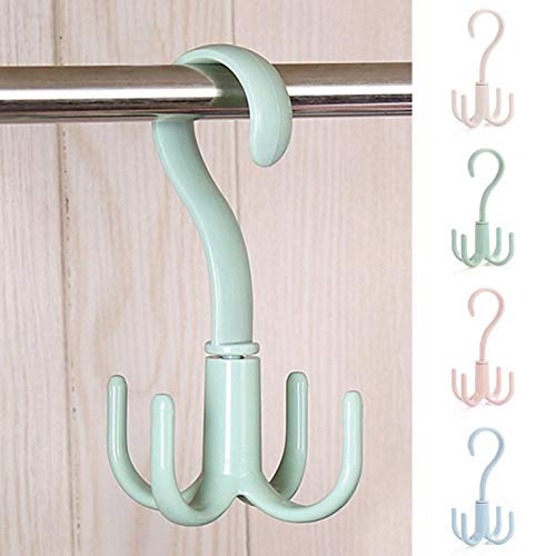 Creative rotating four-claw hook mounted on wall, holding keys and utensils.