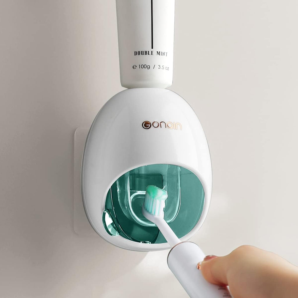 Wall-mounted automatic toothpaste dispenser with lid, hands-free tube squeezer for kids & adults.