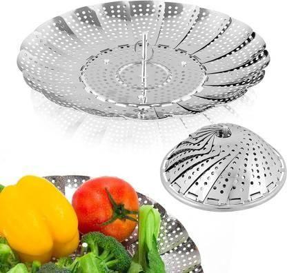 Expandable stainless steel steamer basket in a pot with broccoli steaming, featuring the safety tool.
