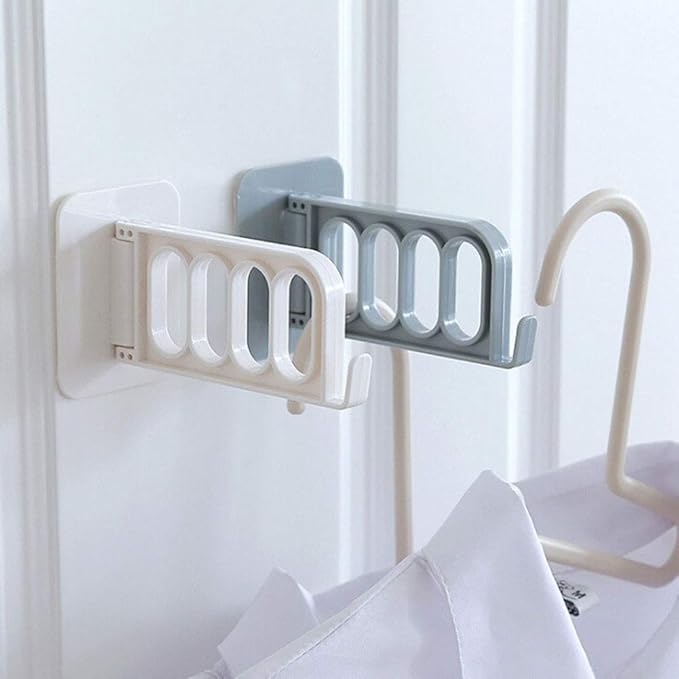 Set of 2 white adhesive wall-mounted laundry drying racks holding clothes hangers for convenient clothes drying.