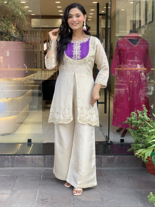 Model wearing TRENDBUY K501 Roman Silk Palazzo Kurta Set with purple coding sequence embroidered yoke, standing elegantly.
