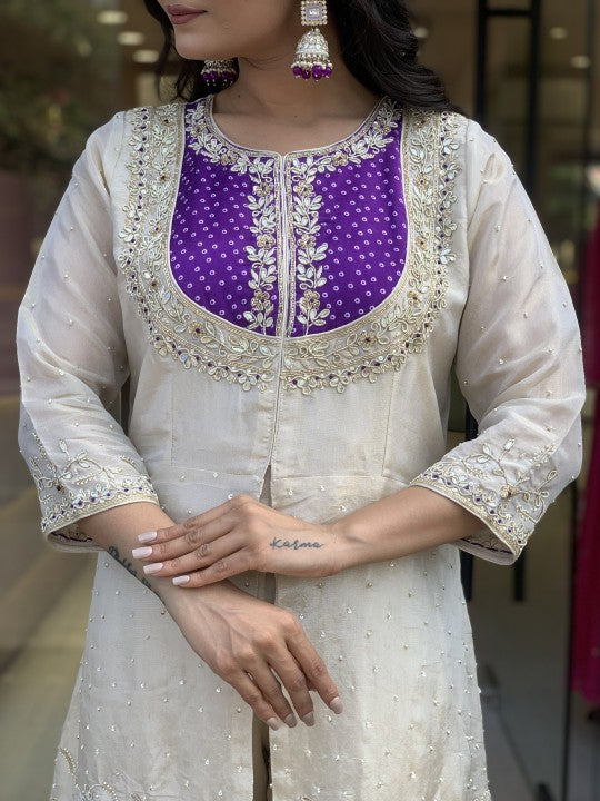 Detailed view of the Roman Silk kurta's embroidered yoke and sleeve cuffs in TRENDBUY's K501 design, purple accent.