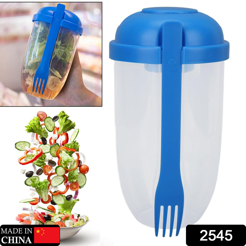 Portable salad cup filled with fresh fruit & vegetables, separate dressing compartment for business travel.