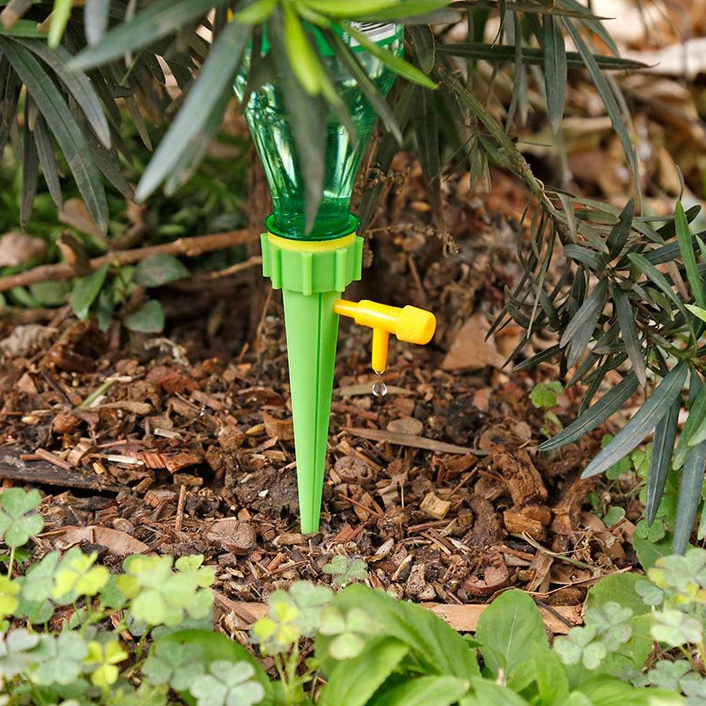Close-up of the adjustable green control valve switch attached to a blue plastic cone.