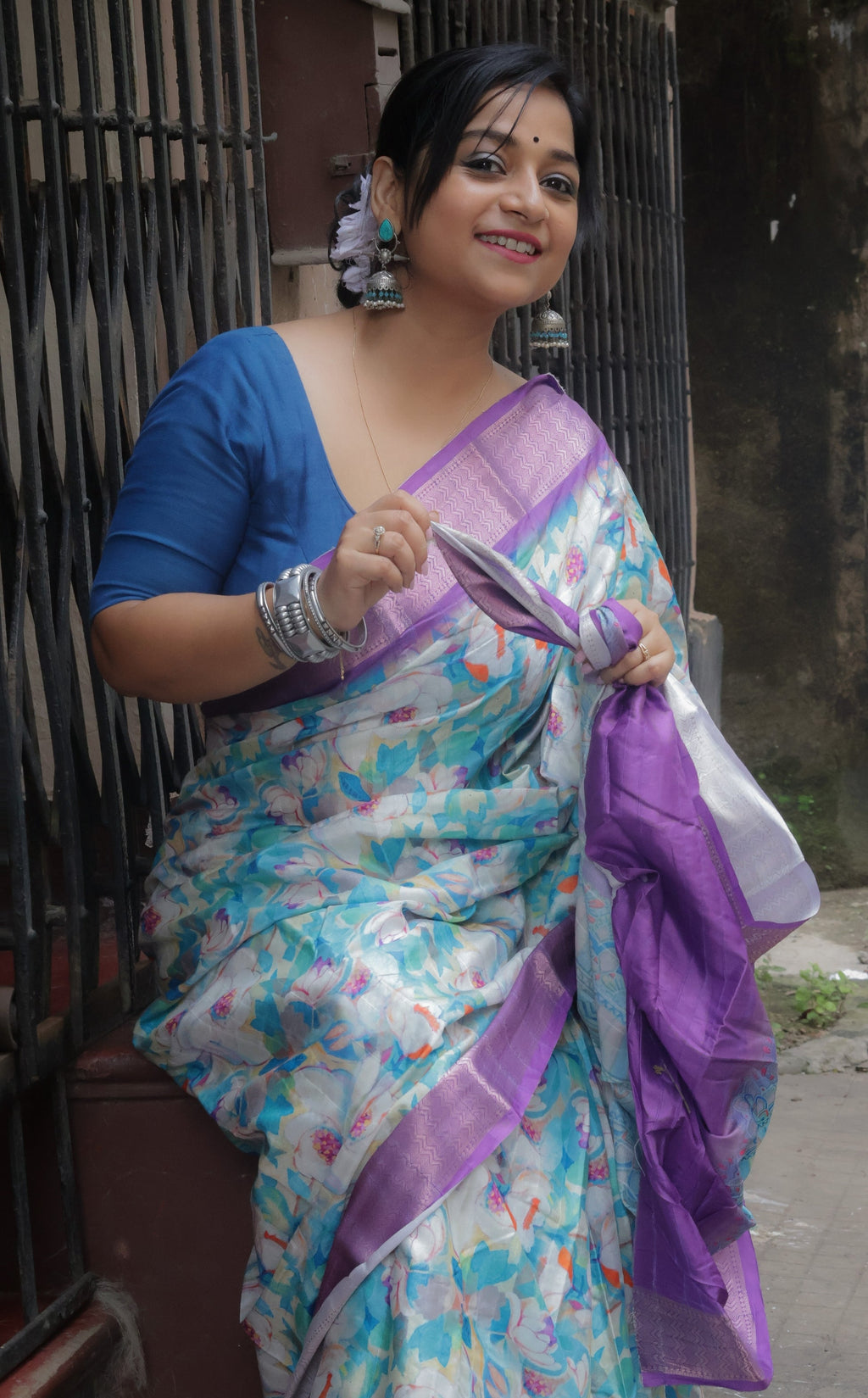 Vibrant purple printed saree with intricate design