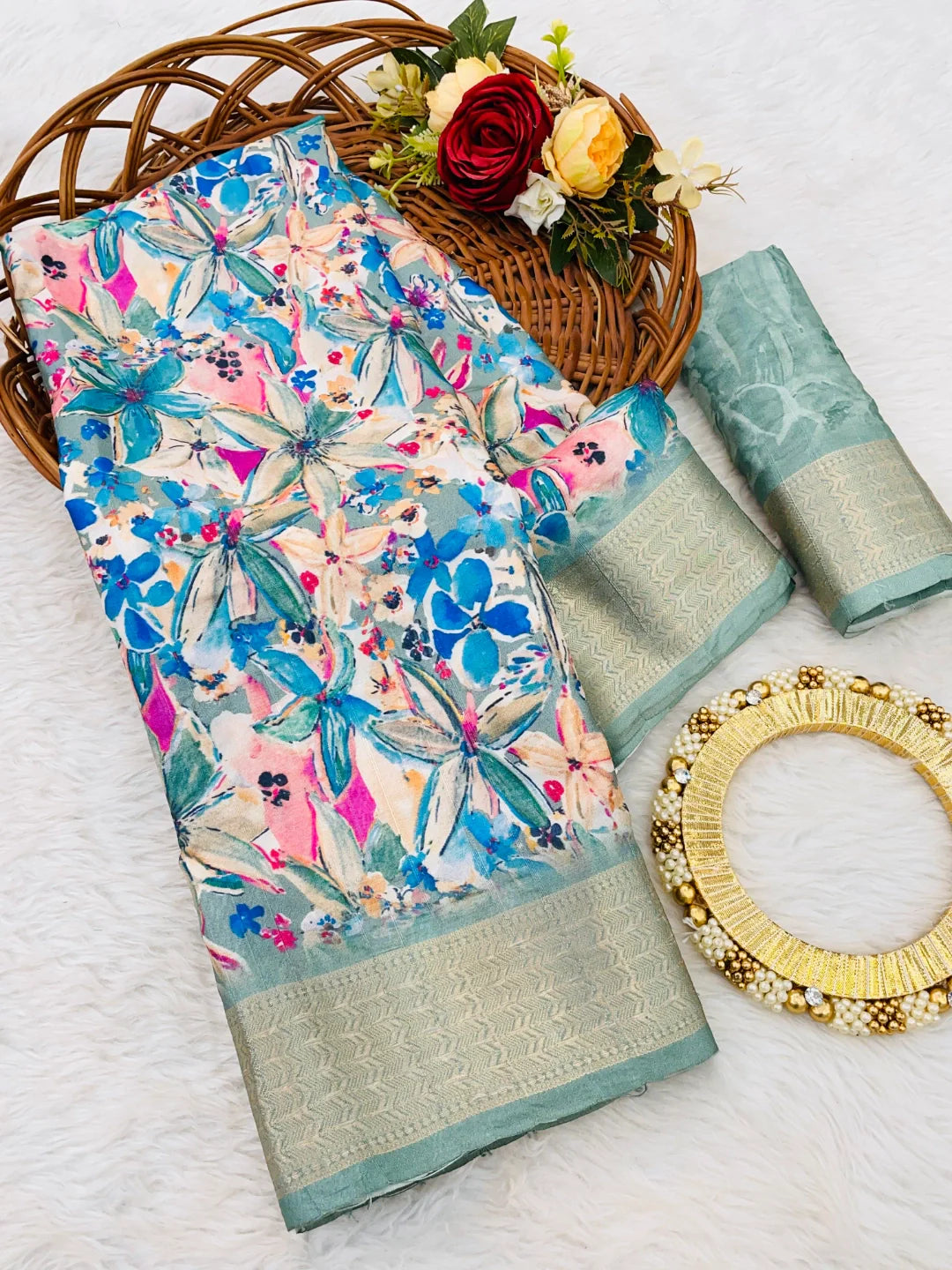 Latest designer digital printed saree showcasing vibrant patterns and matching blouse piece.