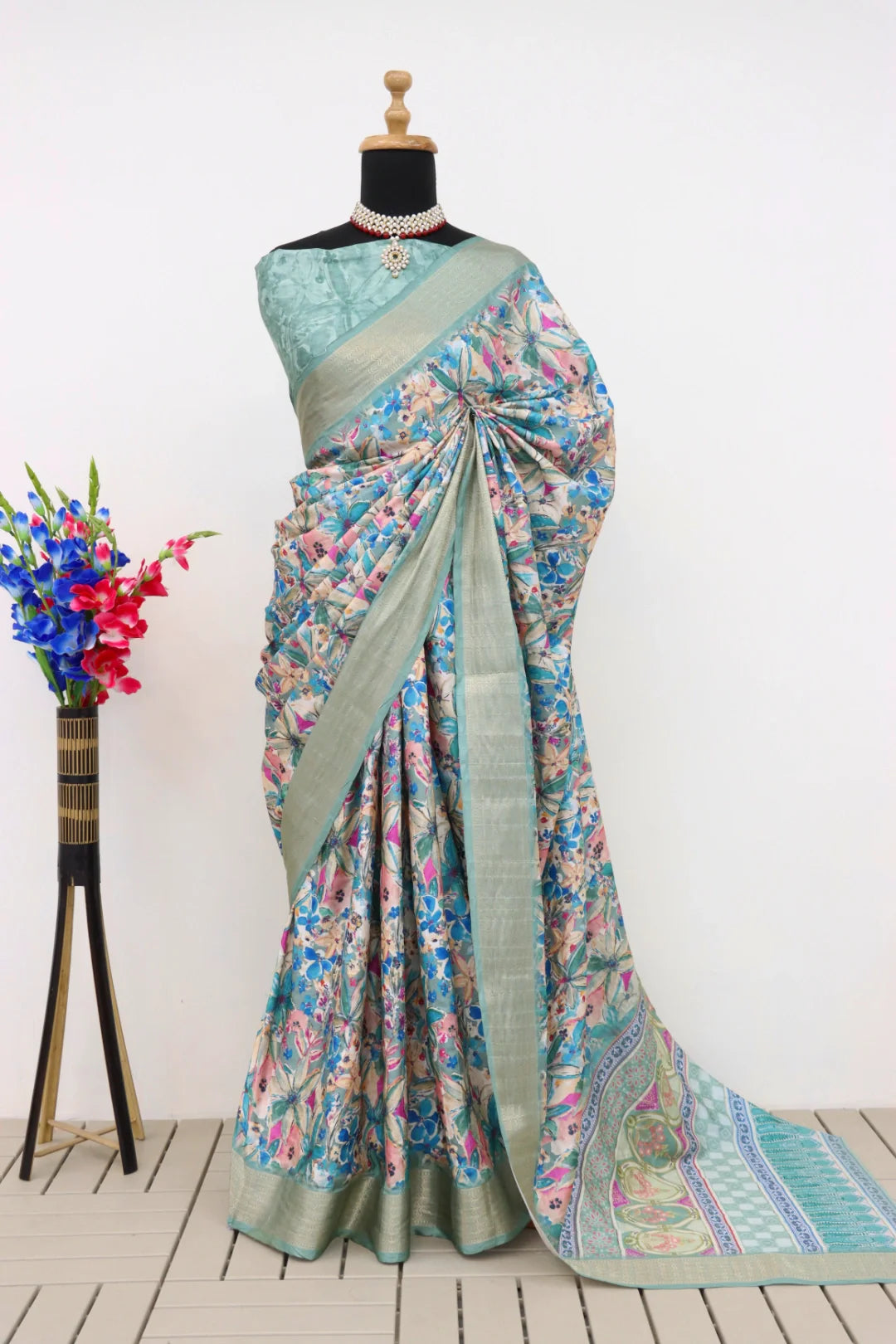 Latest designer digital printed saree with a matching blouse.