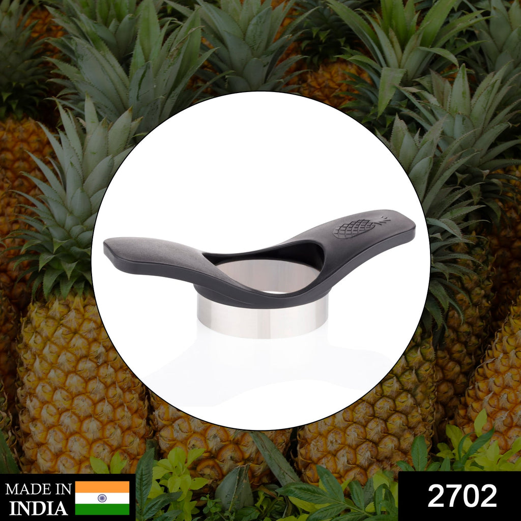 Pineapple cutter in action, slicing a pineapple into fine spirals for kitchen use.
