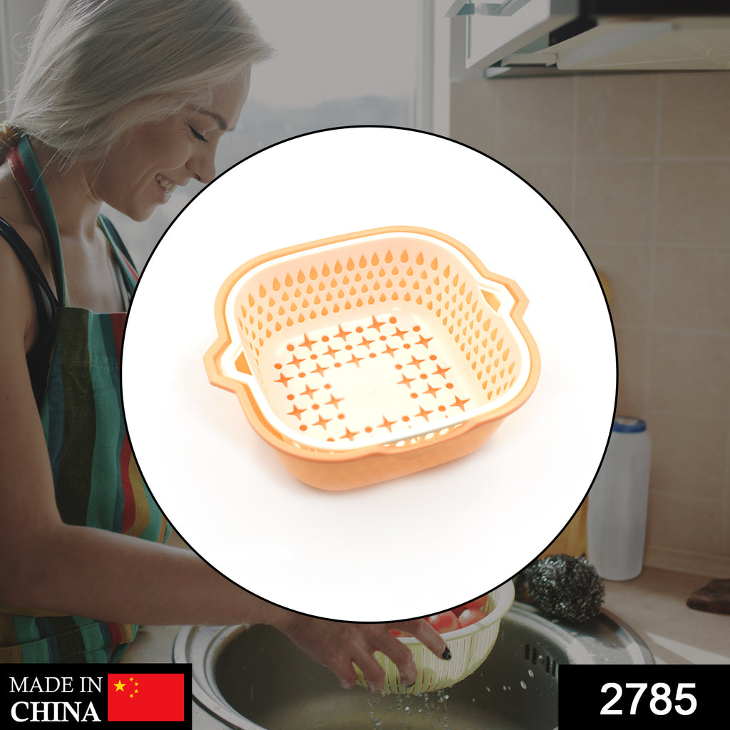 Green 2-in-1 basket strainer with grapes, perfect for rinsing fruits and vegetables.