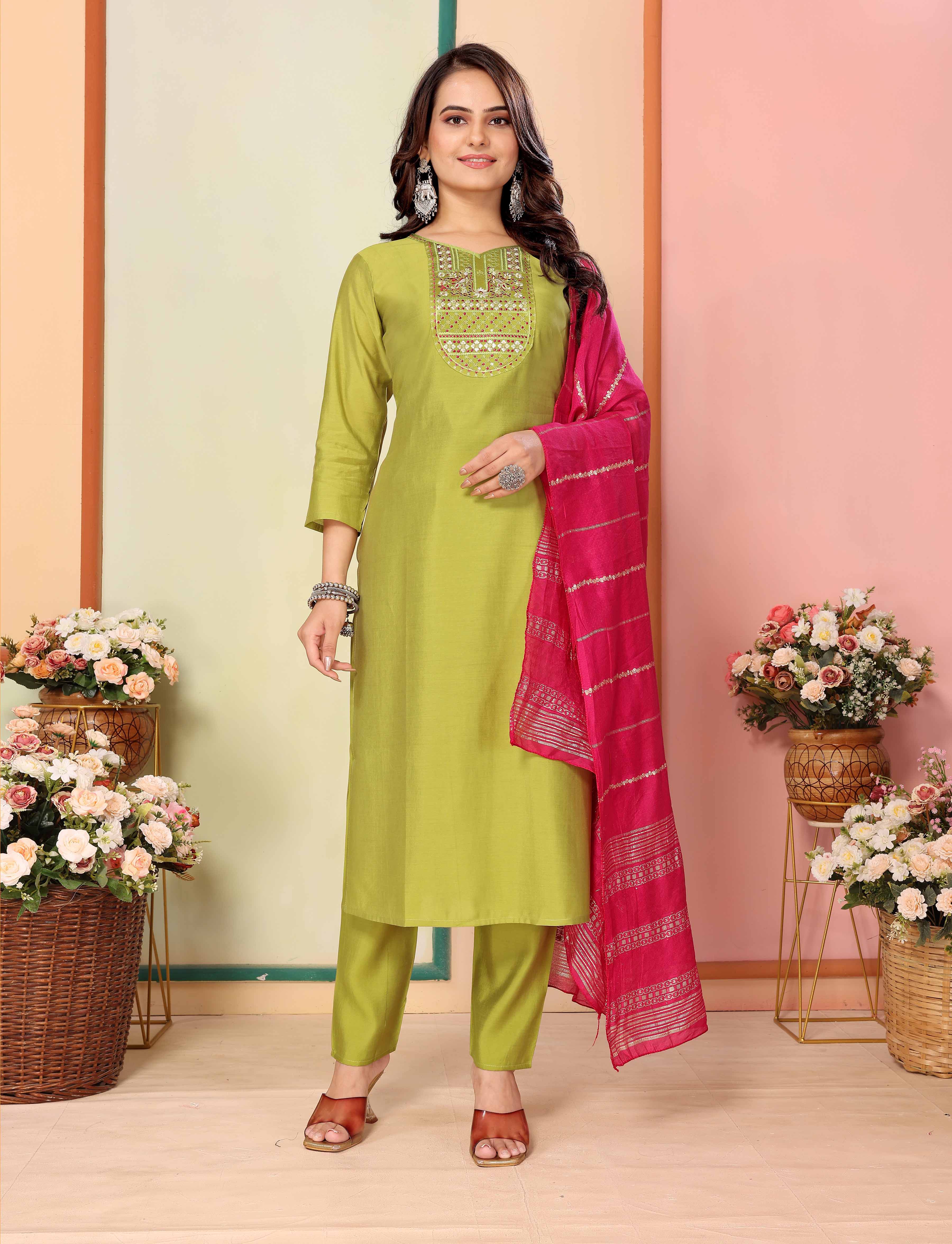 Full length front view of model standing confidently in lime green silk kurta set with draped pink dupatta, showing overall design by TRENDBUY.