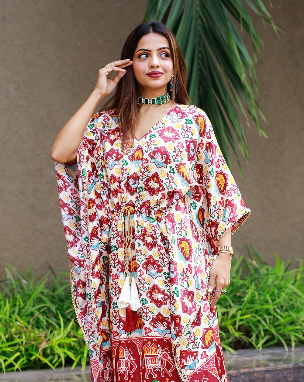 Close-up of intricate Gotta Patti lace border and golden Lagadi Patta detailing on the side hem