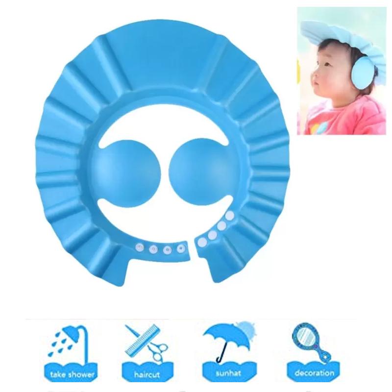 Adjustable yellow baby shower cap on a baby for safe and comfortable eye protection during bath time.
