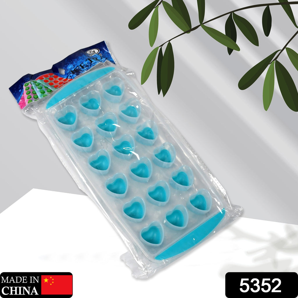 Heart-shaped ice tray with flexible silicon bottom, demonstrating easy push pop-up release of 18 ice cubes.