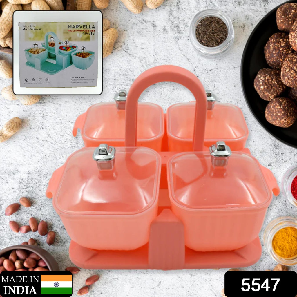 Multipurpose 4-piece clear plastic airtight dry fruit storage jar set with lids and tray for snacks.