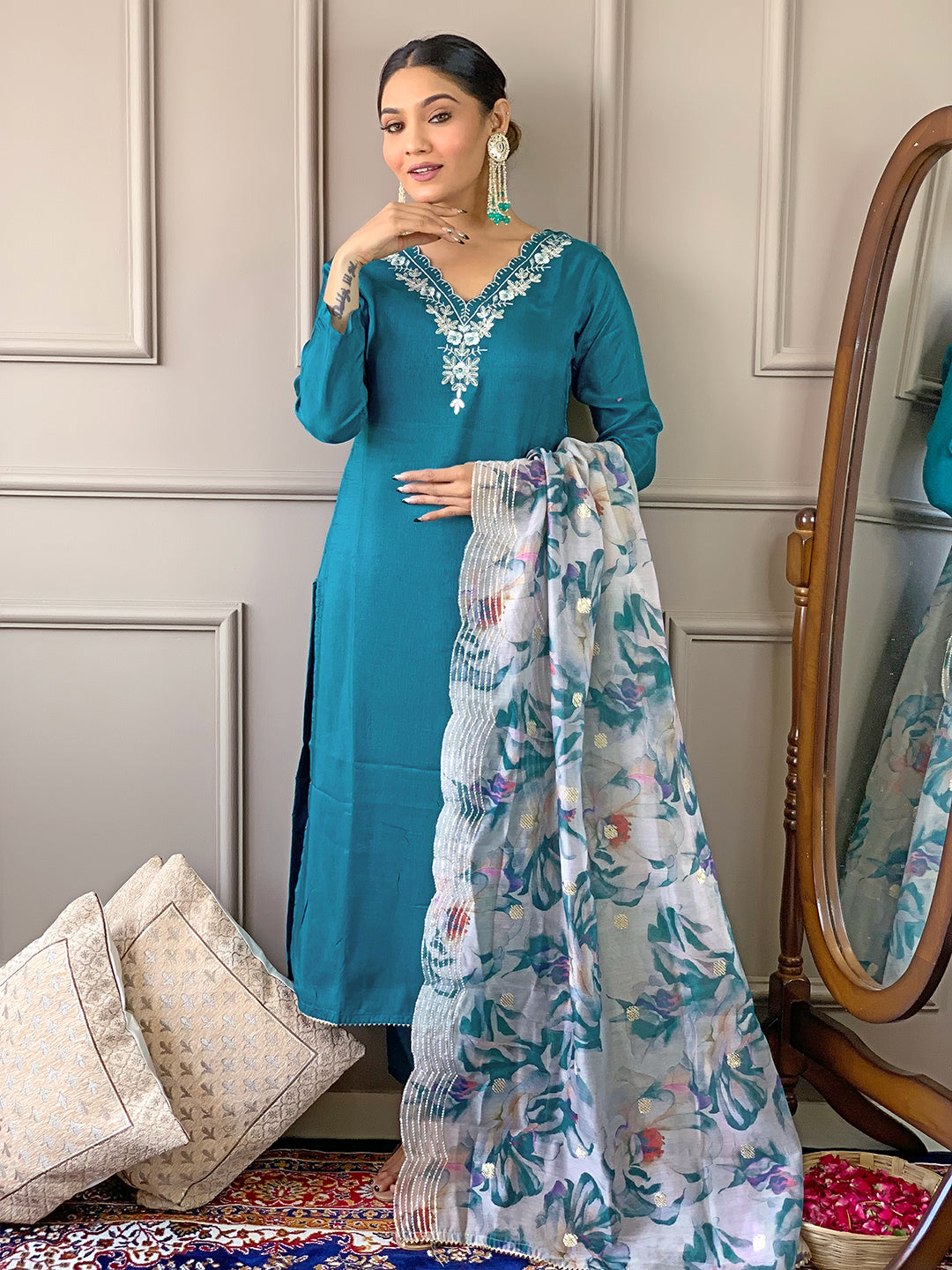 Model looking sideways while wearing TRENDBUY D468 Rama green kurti set, gently holding the dupatta.