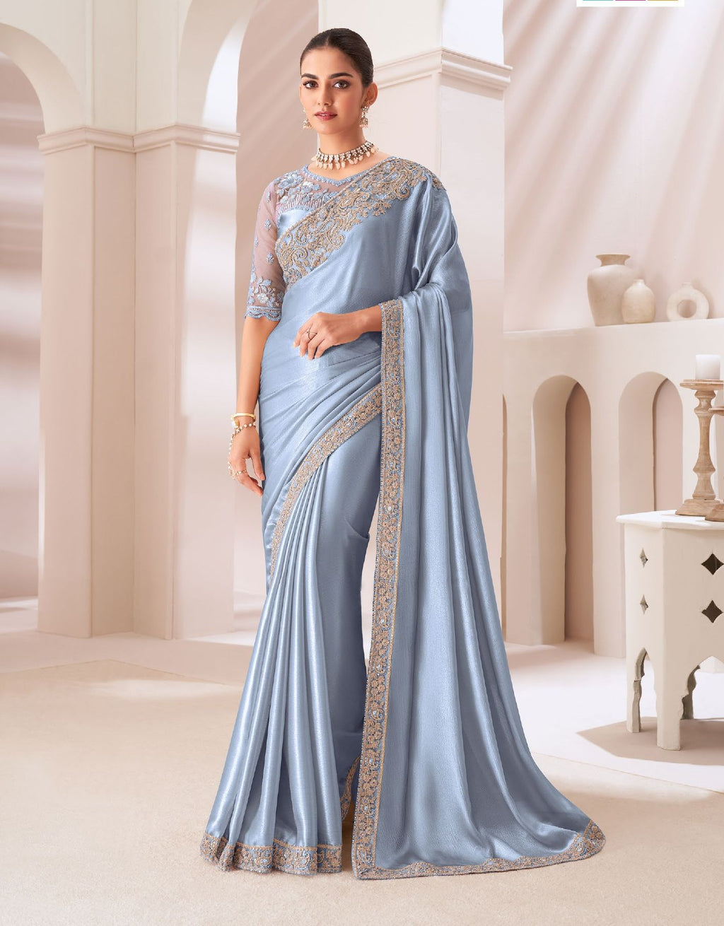 Elegant light-colored festival wear sartin chiffon saree