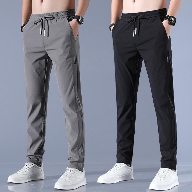 Combo pack of 2 men's slim-fit NS Lycra tapered track pants in black and grey