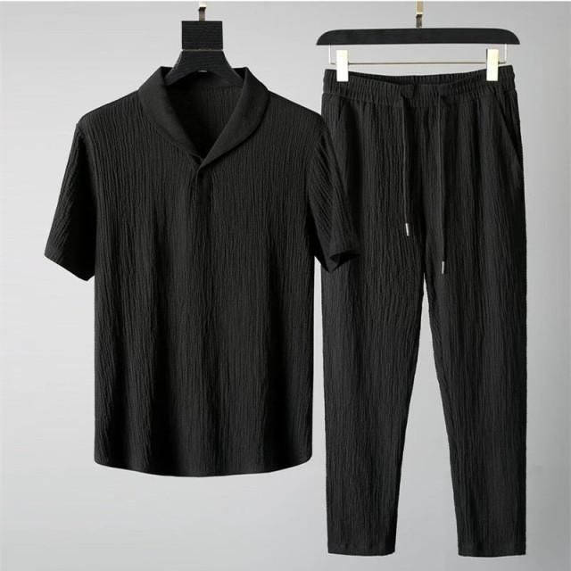 Man wearing men's black corduroy co-ord set