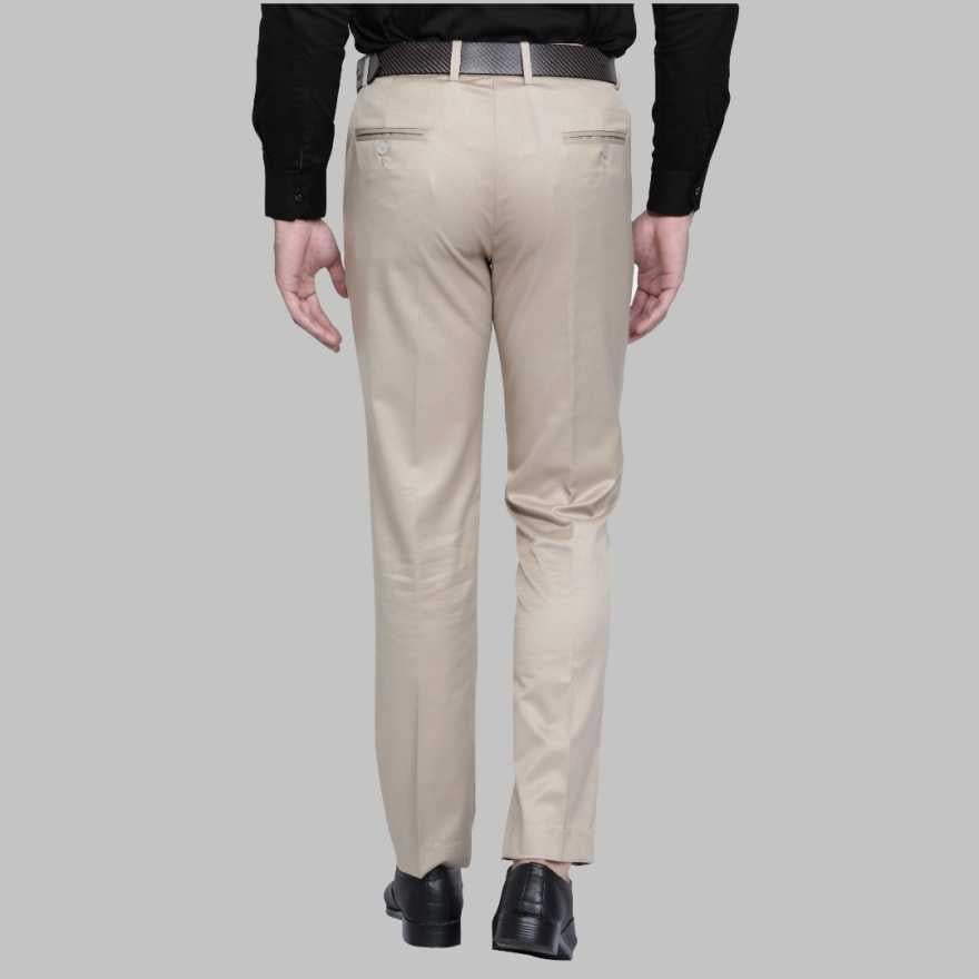Close-up of the neat stitching, secure button closure, and smooth fabric texture on the waistband of beige formal pants