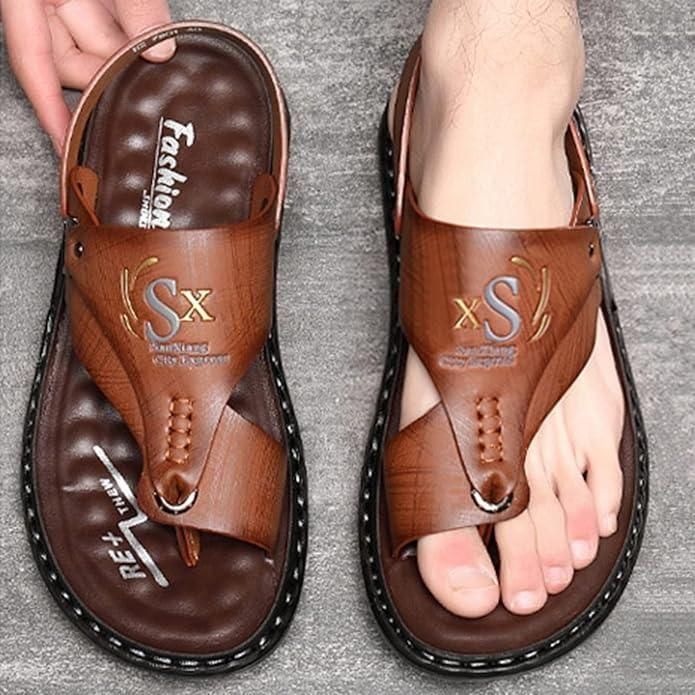 Brown sandals with 'XS' logo on a gray background