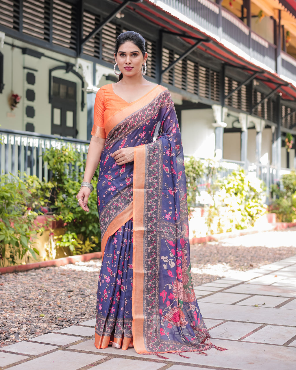 Elegant woman in Royal Blue and Orange Digital Print Linen Saree with a matching blouse, full body shot.