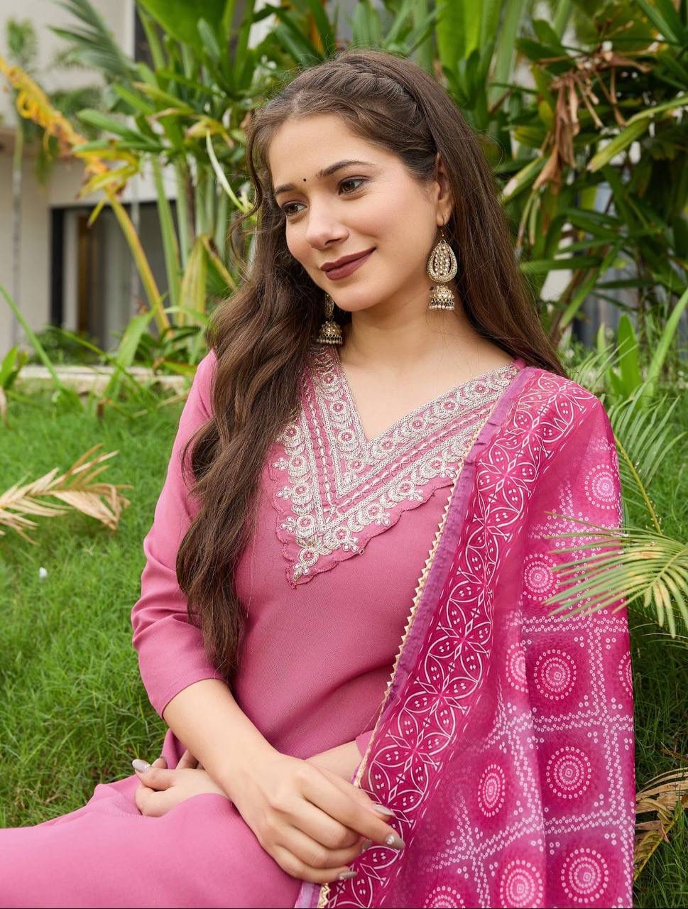 Close-up of woman wearing TRENDBUY Gajri Rayon Embroidered Kurta with patterned Taby Dupatta, showcasing intricate neckline embroidery