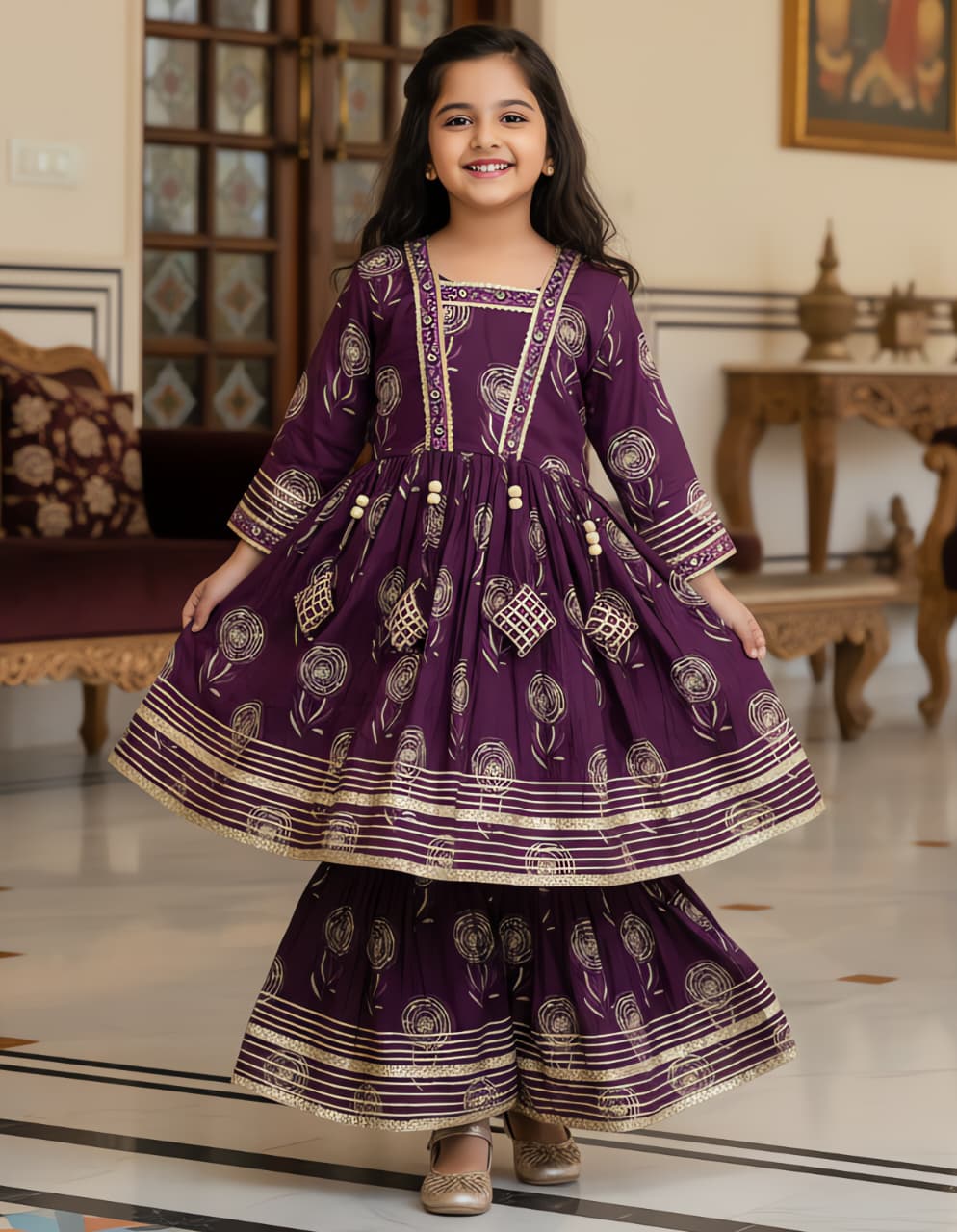 Full view of a cheerful girl in a purple ethnic kurta kediya and sharara set, demonstrating the outfit's flow.