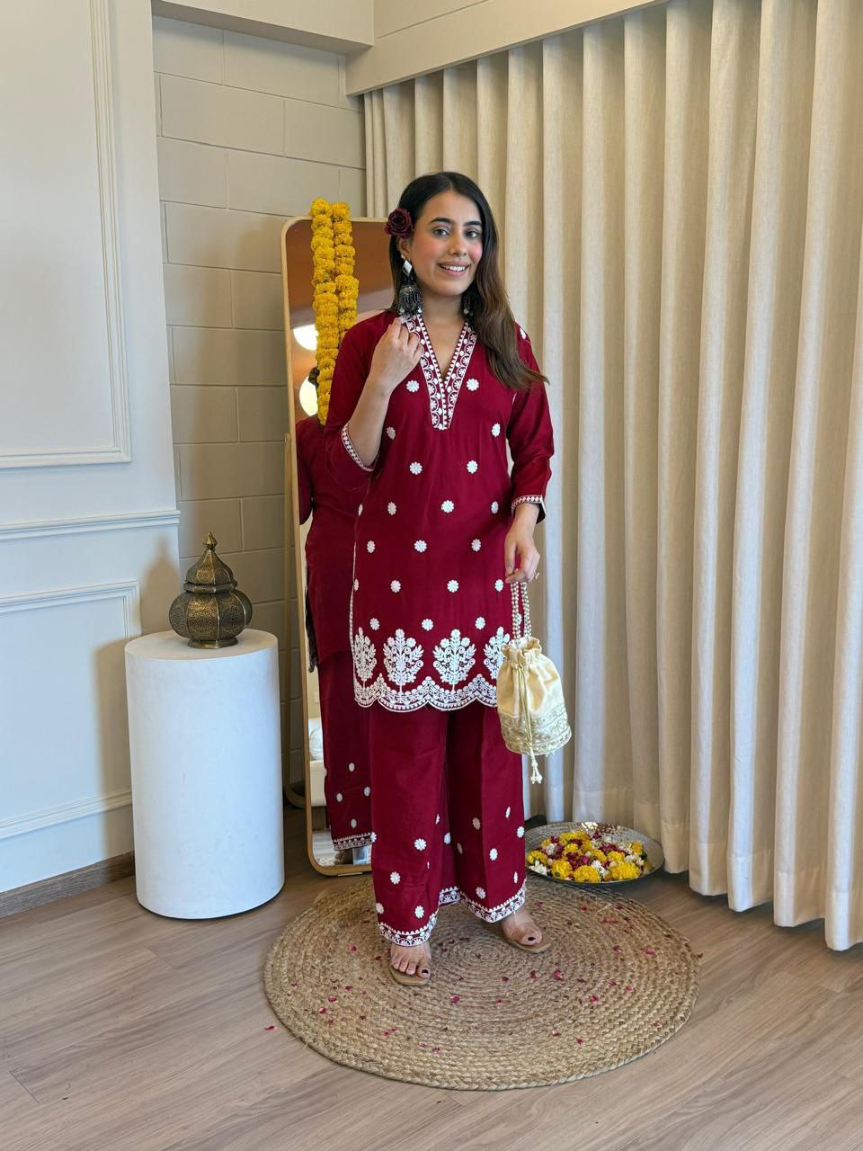 Model wearing a maroon Lakhnavi embroidered rayon co-ord set, featuring a kurta top and palazzo pants.