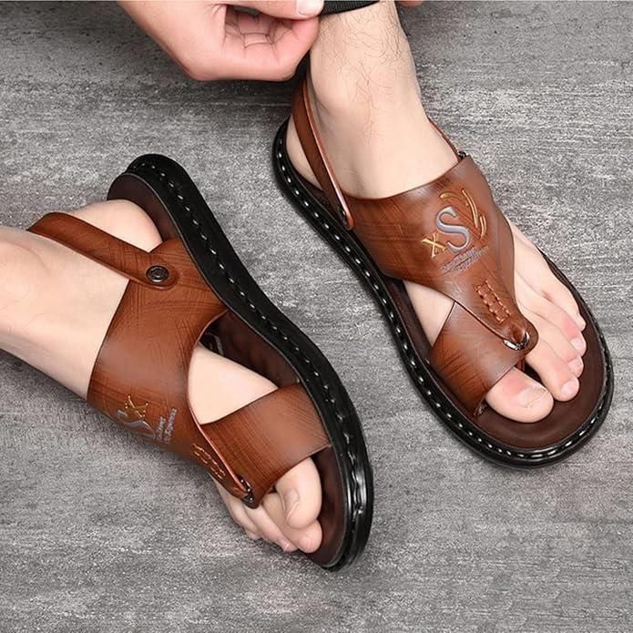 Brown sandals being worn on a gray surface
