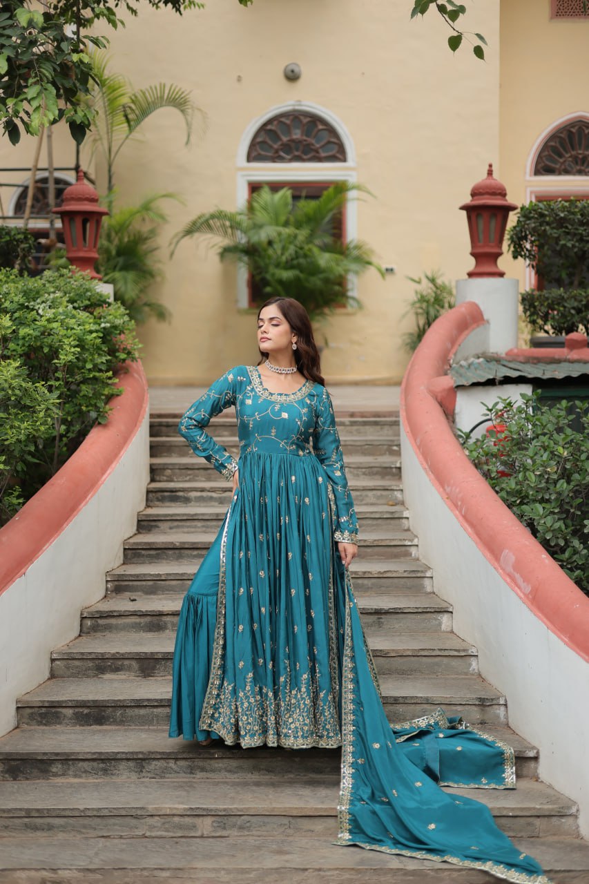 Rama Chinon three-piece Sharara Suit with rich sequin embroidery, featuring flared sharara pants and matching dupatta.