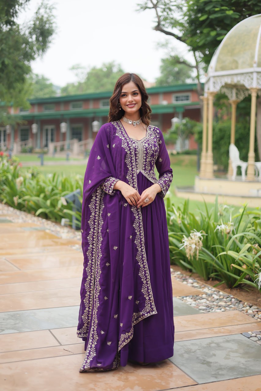 Wine color faux blooming multi embroidered gown with intricate detail and elegant design.