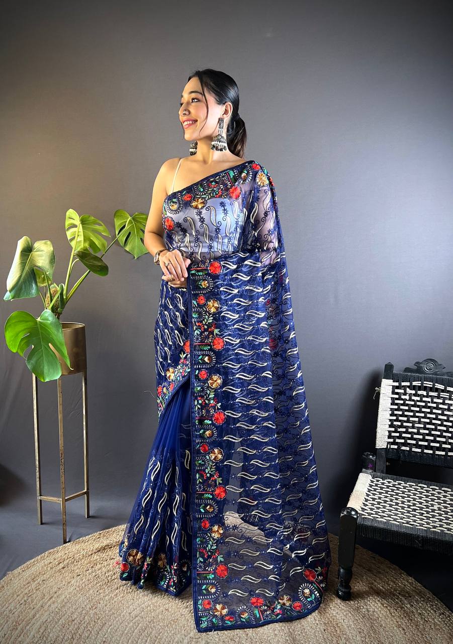 Elegant partywear designer saree featuring exquisite chain stitch work.