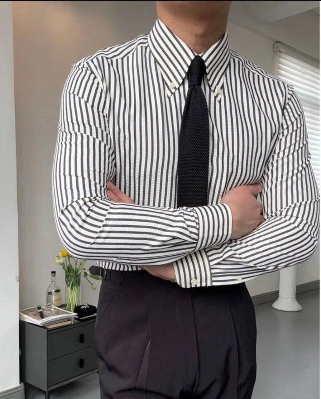 Modern men's black and white striped formal shirt by TRENDBUY, styled with a sophisticated black tie and dark pants